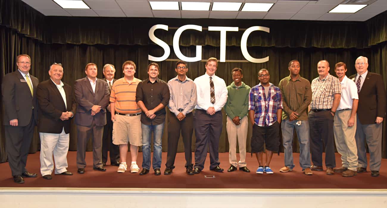 South Georgia Technical College Vice President for Academic Affairs David Kuipers, Vice President for Economic Development Wally Summers, Automotive Technology instructor Brandon Dean, Dean for Academic Affairs Dr. David Finley, Kauffman Tire VP of Human Resources Brian Sisson, Kauffman Tire Director of Training Steve Smith, and Kauffman Tire Training Manager Andrew Bailey are pictured with the latest graduating class of the SGTC Kauffman Tire Automotive Chassis and Climate Control Specialist program. Those graduates include Joshua S. Burton, Juan J. Duque, Charlie L. Grier, Xavier K. Hansell, Jr., Zachary O. Higgs, Tyler M. Kisson, Connor P. Parker, Richard H. Pokojski, and Mauricio Z. Segovia.