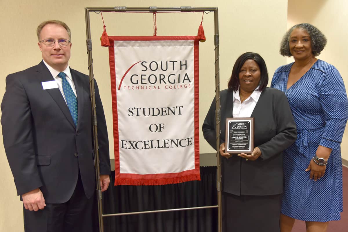 Annie Streeter of Americus, a South Georgia Technical College (SGTC) Accounting student, was named SGTC Student of Excellence. She is shown with SGTC Vice President of Academic Affairs David Kuipers and Instructor Brenda Boone.