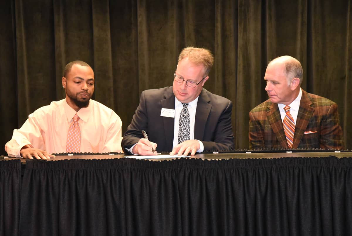 Shown above from left to right are: South Georgia Tech PBL President Racarda Blackmon, SGTC Vice President of Academic Affairs David Kuipers and Americus Mayor Barry Blount signed the American Enterprise Day program.