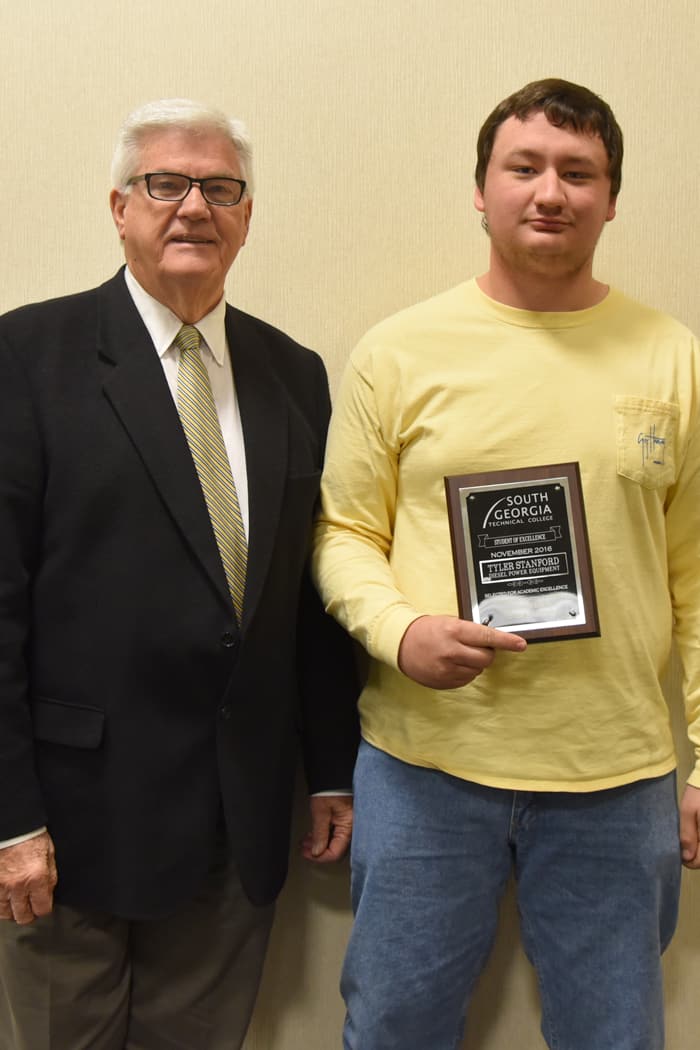 Tyler Stanford (right) was named SGTC Student of Excellence for November. He is pictured with SGTC Dean for Academic Affairs Raymond Holt.