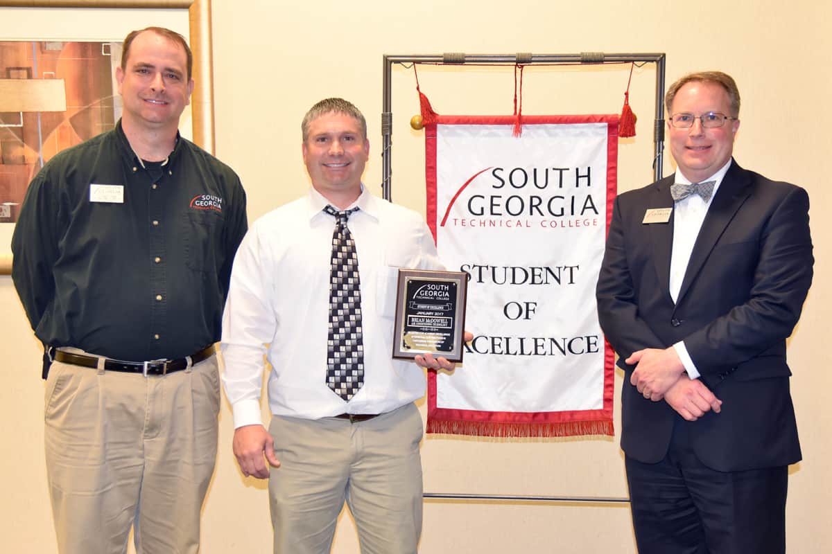 Brian McDowell (center) was named SGTC Student of Excellence for January. He is pictured with his nominating instructor Glynn Cobb (left) and Vice President for Academic Affairs David Kuipers (right).