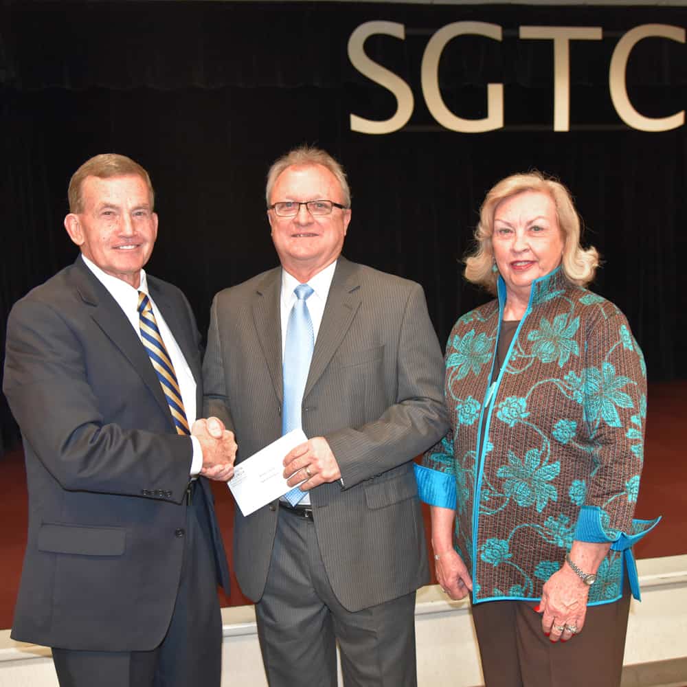 South Georgia Technical College President Emeritus Sparky Reeves (l) and Allene (r) are shown above with the SGTC 2017 Instructor of the Year Charles Christmas (c).