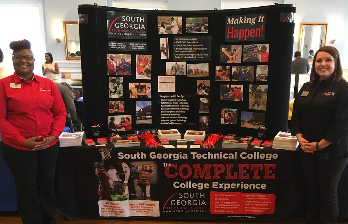 SGTC High School Initiatives Specialists Brittny Wright and Beth Brooks are shown above with the South Georgia Technical College display at the REACH Day at the Capitol.