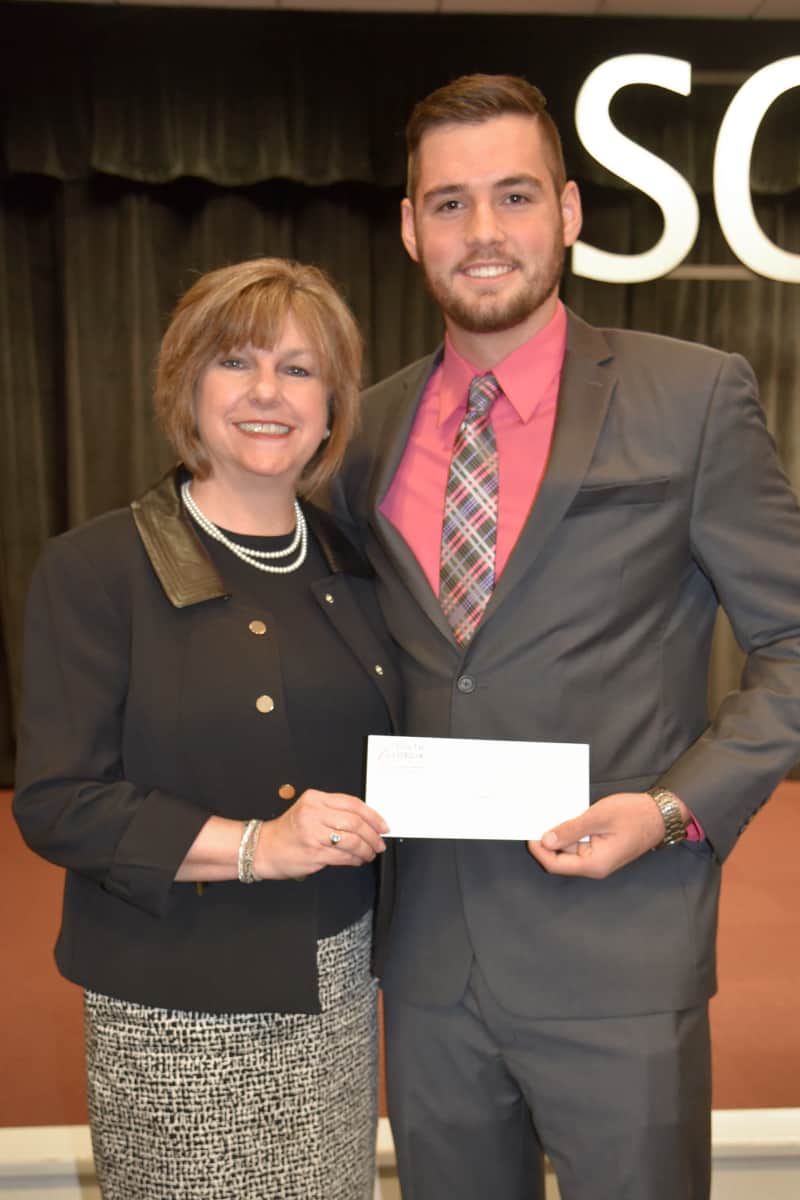 Americus Rotary Club President Reda Rowell (l) is shown above presenting a check to Christopher McGee (r), who was selected as the SGTC 2017 GOAL student of the year.