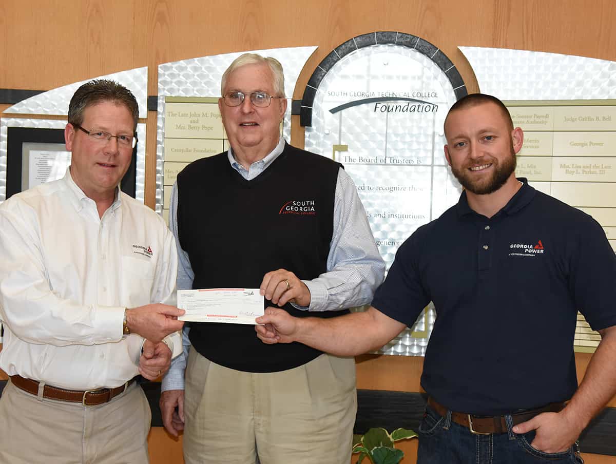 South Georgia Technical College Vice President of Economic Development Wally Summers is shown above (c) with Georgia Power’s Gordy Morris (l) and Georgia Power’s Michael Hardester (r), who is an alumni of the SGTC Electrical Lineworker program.
