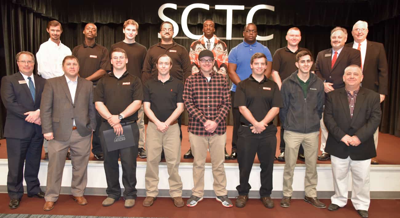 SGTC Kauffman Tire graduates are pictured with Kauffman Tire officials Steve Smith (first row, far right) and Brian Sisson (first row, second from left), as well as SGTC officials Vice President for Academic Affairs David Kuipers (first row, far left), Vice President for Economic Development Wally Summers (second row, far right), Dean for Academic Affairs Dr. David Finley (second row, second from right), and Automotive Technology instructor Brandon Dean (second row, far left) at the recent graduate recognition luncheon held on SGTC’s Americus campus.