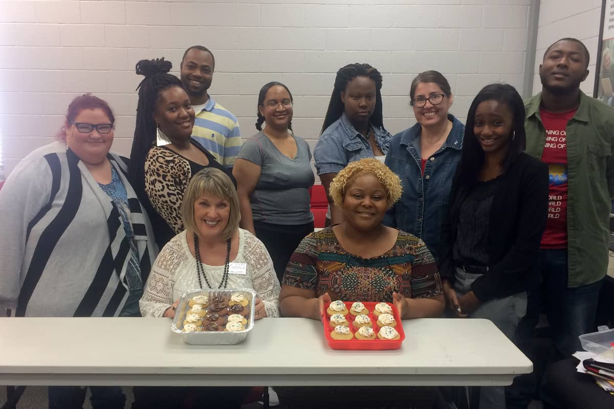 SGTC Americus Campus PBL Advisors (seated from left to right) Donna Lawrence and Dr. Andrea Oates were honored by PBL members and officers with a sweet treat for Advisor Appreciation Day, which was part of a series of events during a special PBL Week held earlier this month.