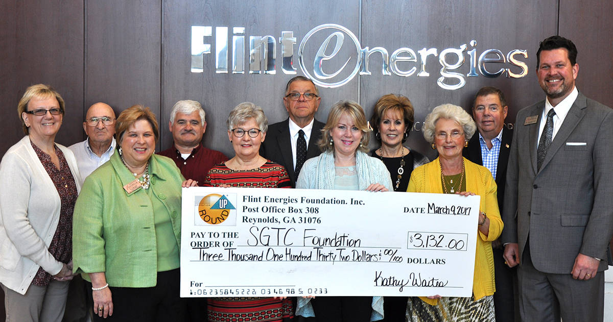 South Georgia Technical College President Dr. John Watford (r) is shown above with members of the Flint Energies Foundation Board accepting $3,132 from the Flint Energies Foundation with SGTC Vice President of Institutional Advancement and SGTC Foundation Executive Director Su Ann Bird (third from left).