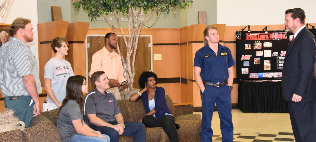 Shown above (far right) is South Georgia Technical College President Dr. John Watford talking with a handful of the students that are taking advantage of the education provided at South Georgia Technical College which was just named as the Best Community College in Georgia by Best Colleges in Georgia.
