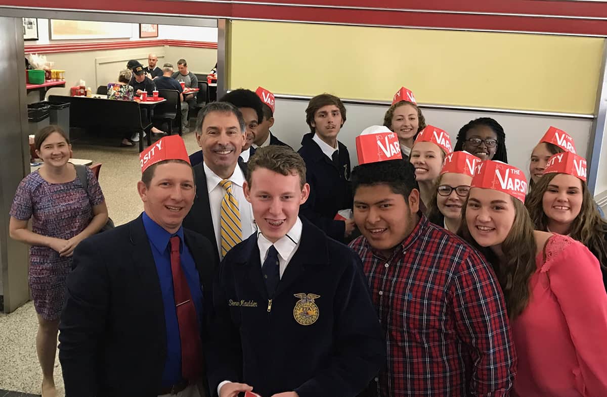 Mike Cheokas is shown above with the FFA students from Marion County Middle/High School during his State Board of Education swearing in session with Governor Nathan Deal.