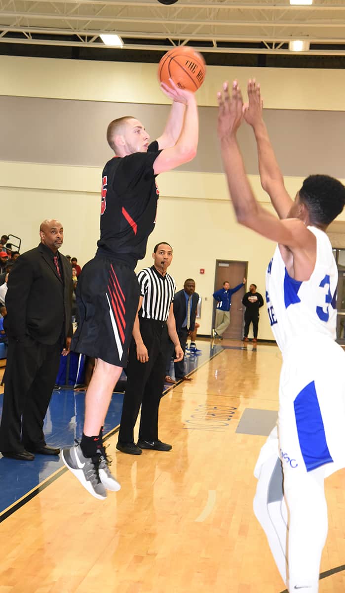 Sophomore Pat Welch, 15, sank the winning three-point basket with 6.8 seconds to allow the South Georgia Technical College Jets to upset the second seeded Gordon College Highlanders in the first round of the NJCAA Region XVII tournament in Barnesville.