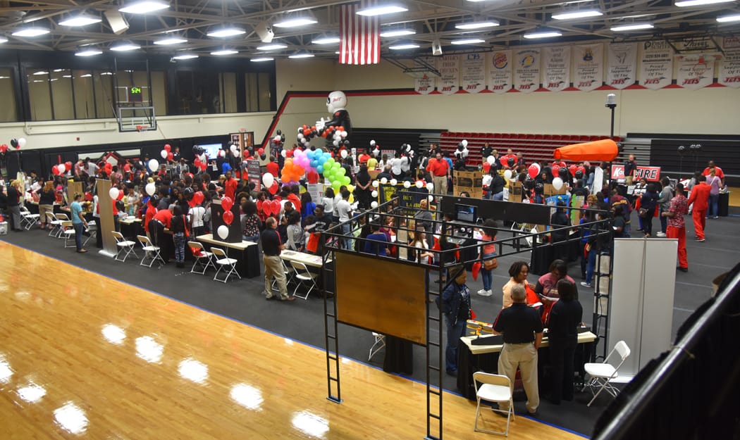 SGTC will host Spring Take-Off on both campuses on Friday, April 7th from 10am until 2pm. Prospective students and their families are encouraged to attend. Show is the gym filled with people and booths during a recent Spring Takeoff event.