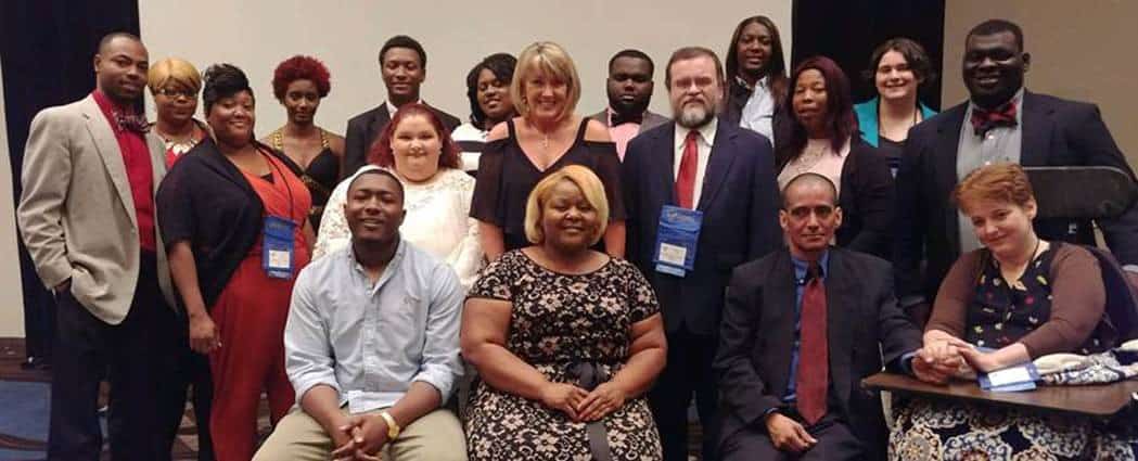 SGTC Americus campus PBL members are pictured with their advisors Dr. Andrea Oates (seated, second from left) and Donna Lawrence (standing, center) at state level PBL competitions in Atlanta.