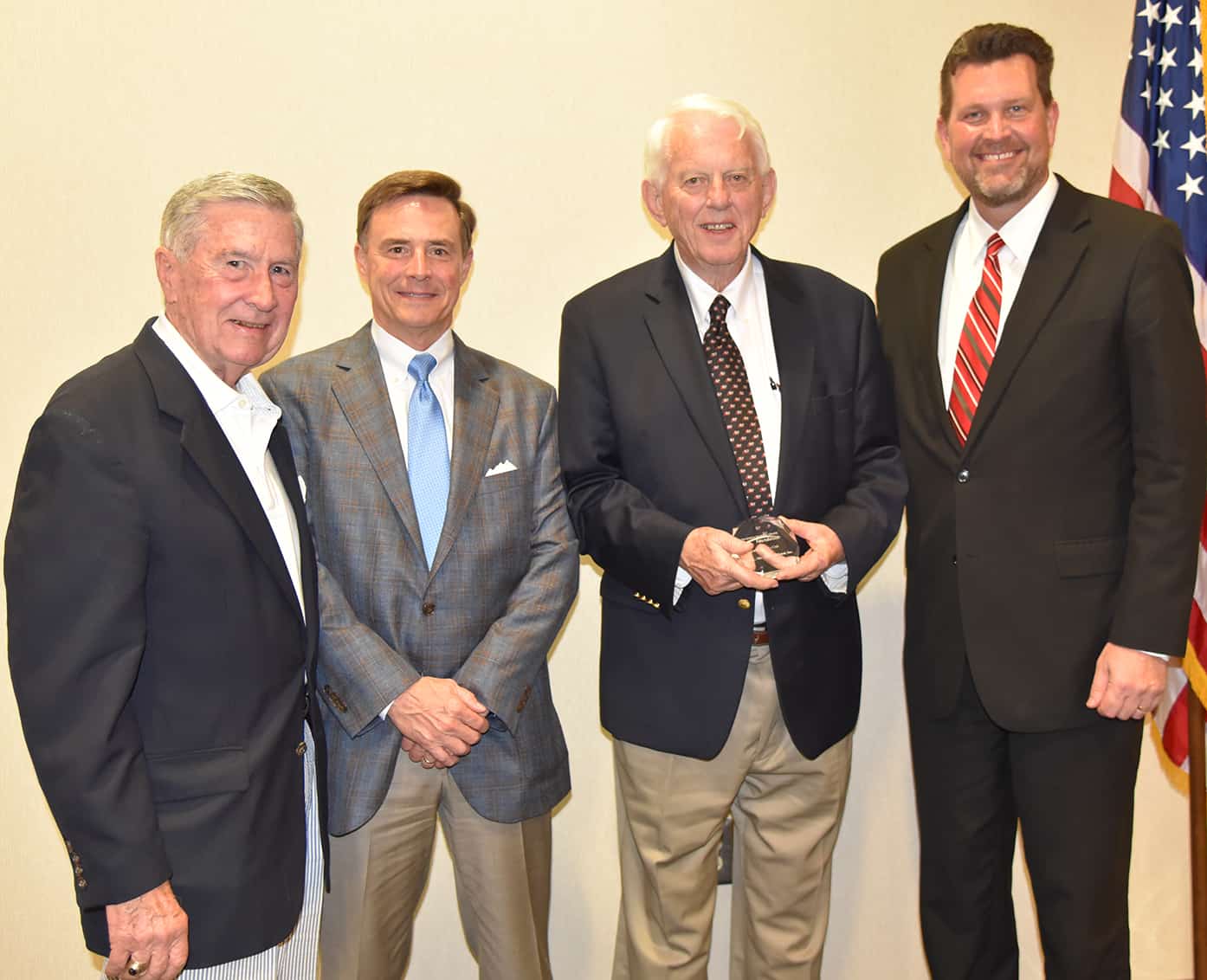 George Hooks, Rick Whaley, and Russell Thomas, Jr. with SGTC President Dr. John Watford.
