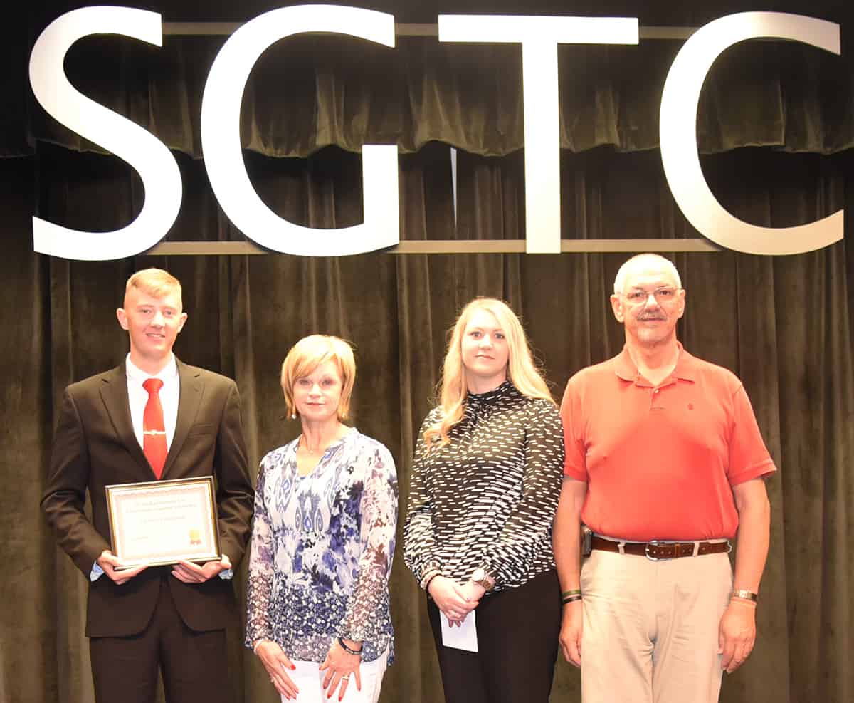 Charles Hale Kinnamon of Americus is shown above (l to r) receiving the Lt. Michael Sangster Scholarship award for the 17-01 class from Lt. Michael Sangster’s mom, Connie Sangster Youngblood, his sister, Melissa and Michael’s father, Robert Sangster, Sr.