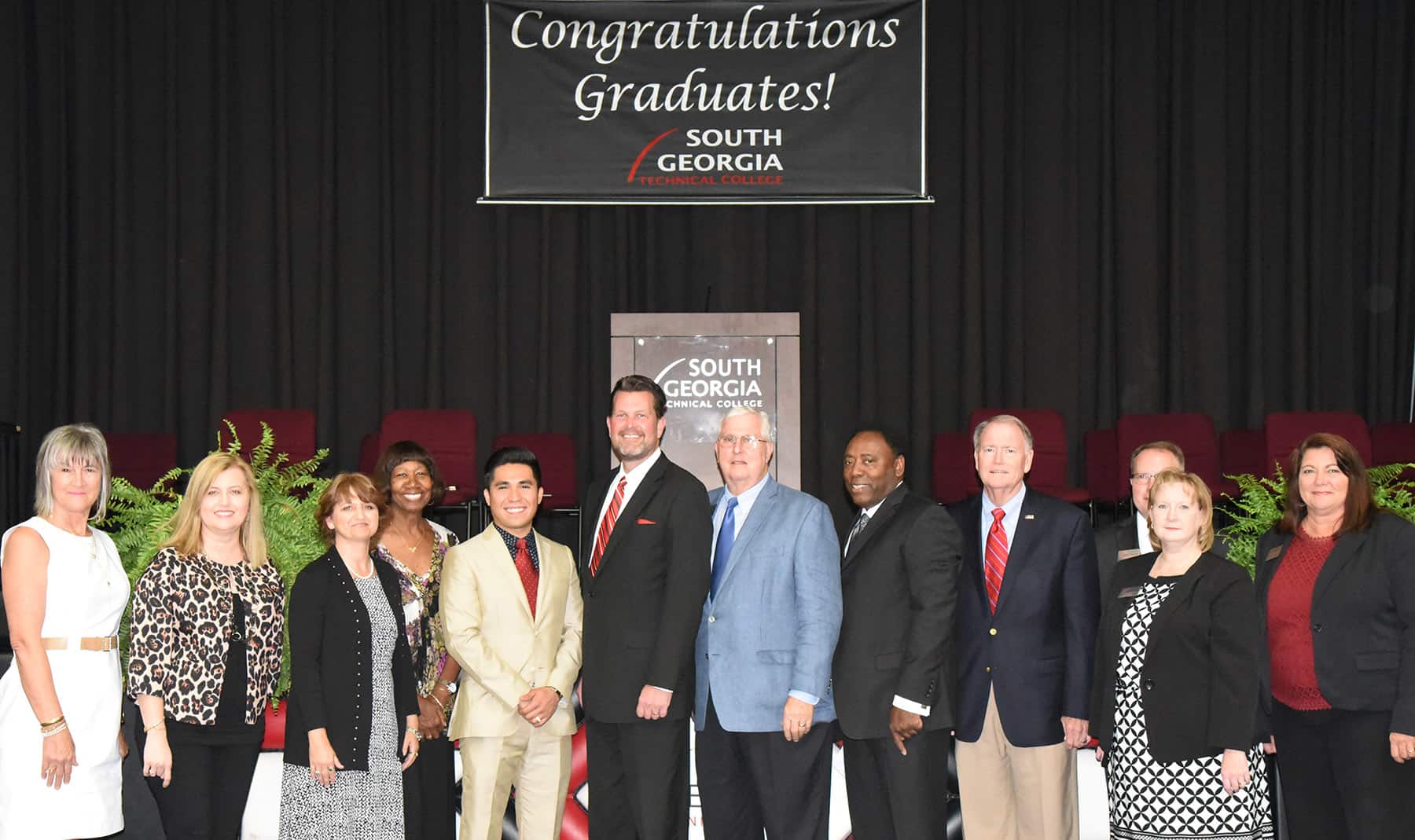 South Georgia Tech GED Graduation Officials - Shown above (l to r) are South Georgia Technical College GED Chief Examiner Connie Wise, SGTC Interim Director of Adult Education Michelle McGowan, Instructor Tonya Visage, SGTC Board Chairperson Janet Siders, SGTC Eagle winner and speaker Pable Castaneda, SGTC President Dr. John Watford, Vice President of Economic Development Wally Summers, Rev. Michael Cunningham, Assistant to the President Don Smith, Vice President of Academic Affairs David Kuipers, Vice President of Administrative Services Lea Coe, and Vice President of Institutional Support and IT Karen Werling.