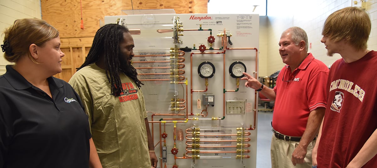 South Georgia Technical College’s Mike Enfinger is shown above showing some students the new equipment that will be utilized in the new Air Conditioning Technology program that will be beginning this fall at the Crisp County Center.