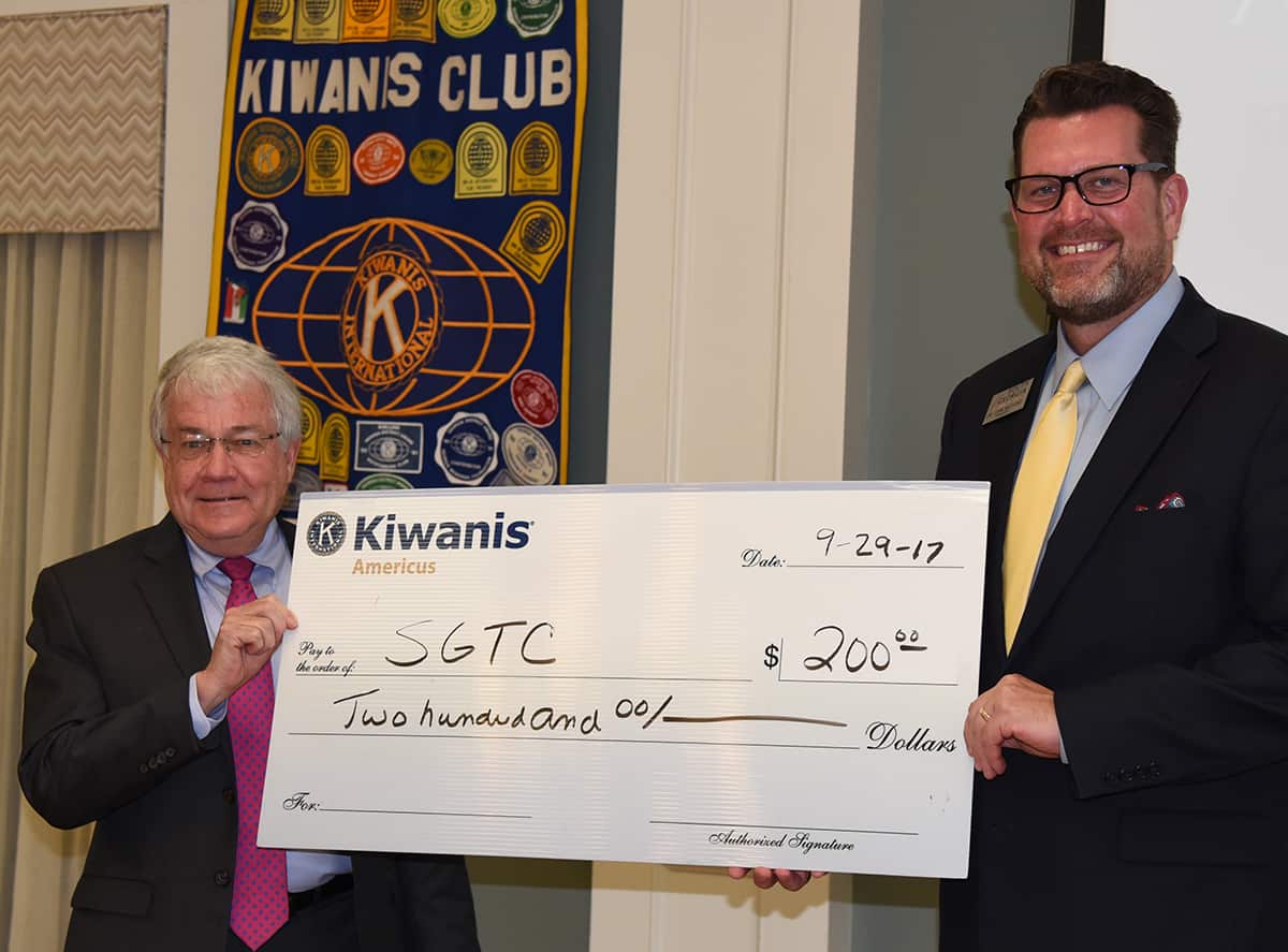 Shown above (l to r) are Jody Wade, President of the Americus Kiwanis Club, presenting SGTC President Dr. John Watford with a donation for the SGTC Foundation.