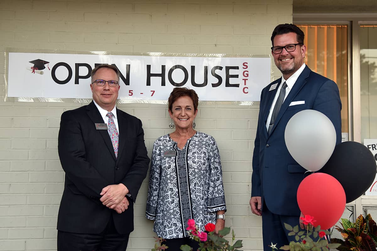 David Kuipers, Lillie Ann Winn and President Dr. John Watford stand in front of the Viola Bailey Center in Montezuma, where SGTC now offers Adult Education classes.