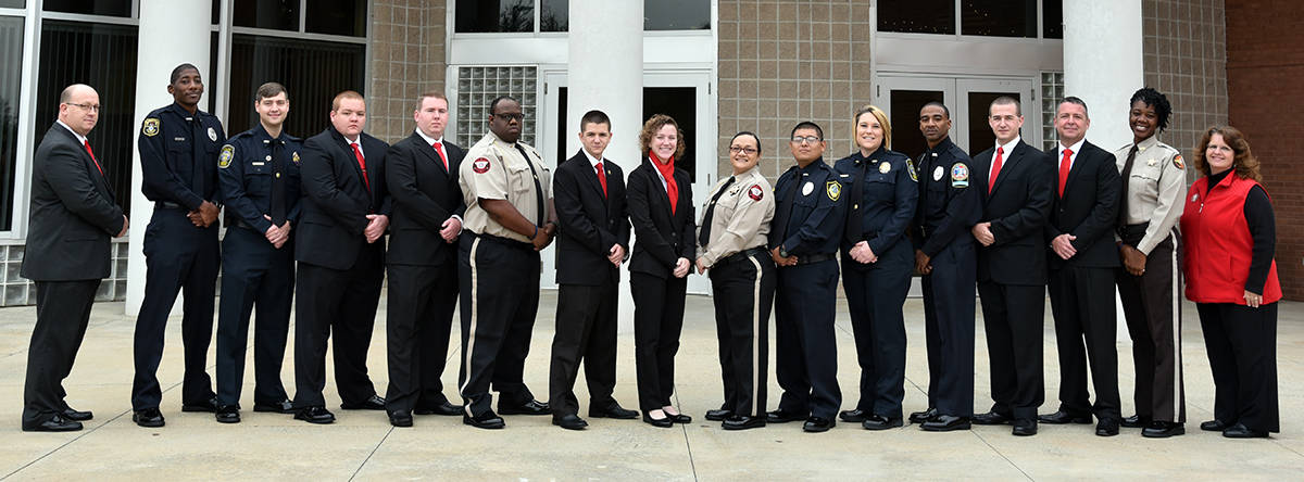 SGTC Law Enforcement Academy graduates are pictured as a class before their graduation ceremony on Dec. 15, 2017. Left to right: Director Brett Murray, Odell Williams III, Justin Lewis, Austin Lavon Spence, Nathan Brown, Anthony D. Davis, Steven Tyler Adams, Taylor Logan Mills, Claudia Marcela Tupper, David Rueda Fierros, Brandy Lee Stokes, Jeffery B. Bell, Christopher Ruric Slocumb, Matthew B. Robinson, Cora Kineshell Baker and Vanessa Wall.