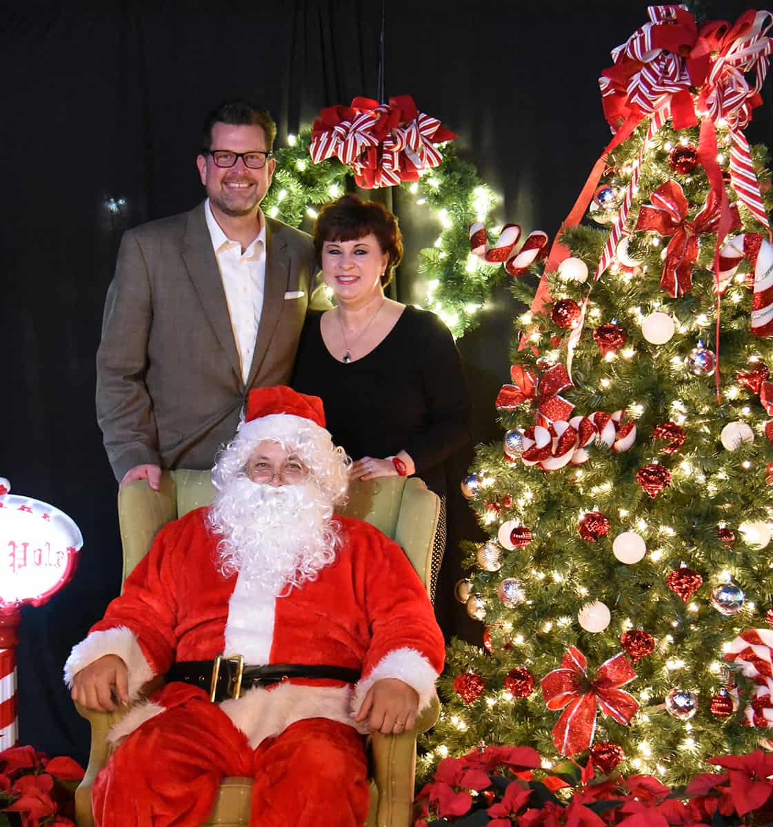 SGTC President Dr. John Watford and his wife, Barbara are shown above with Santa at the SGTC Light Up Your Future event.