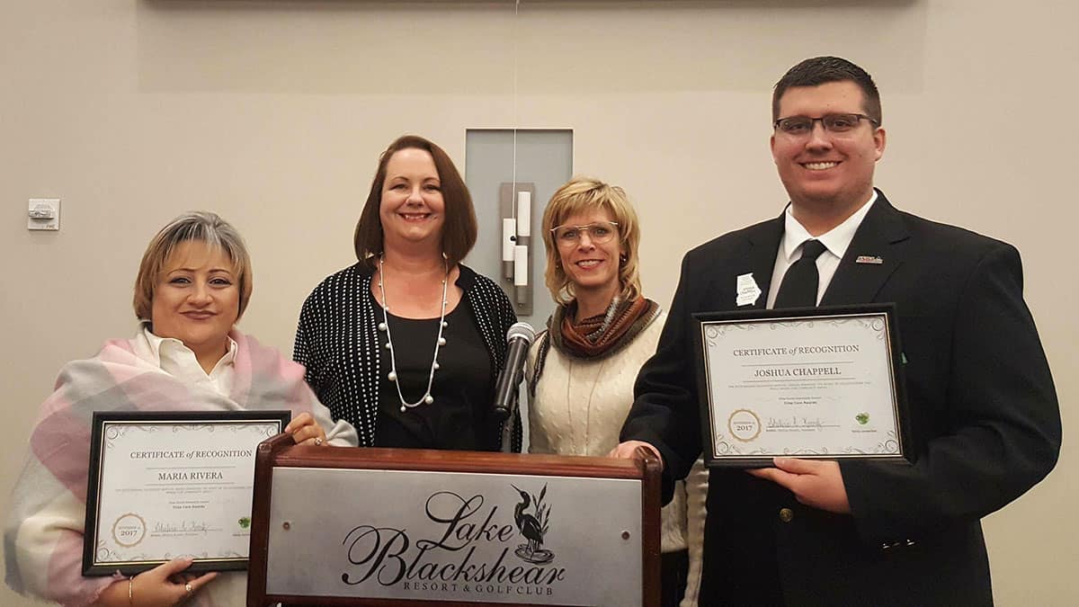 Outstanding Student Volunteer certificate recipients Maria Rivera (far left) and Joshua Chappell (far right) stand with NTHS advisors Kari Bodrey (middle left) and Julia Partain (middle right).