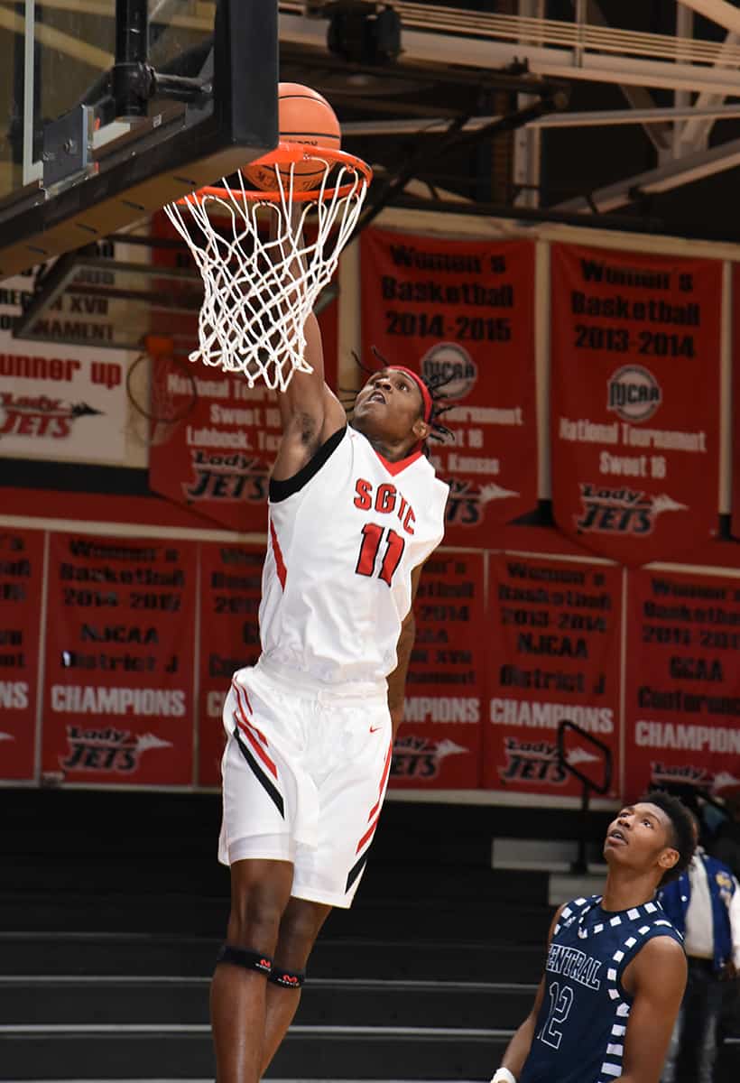 Jets Dawan Bass, 11, goes in for a lay-up against Central Georgia Tech.