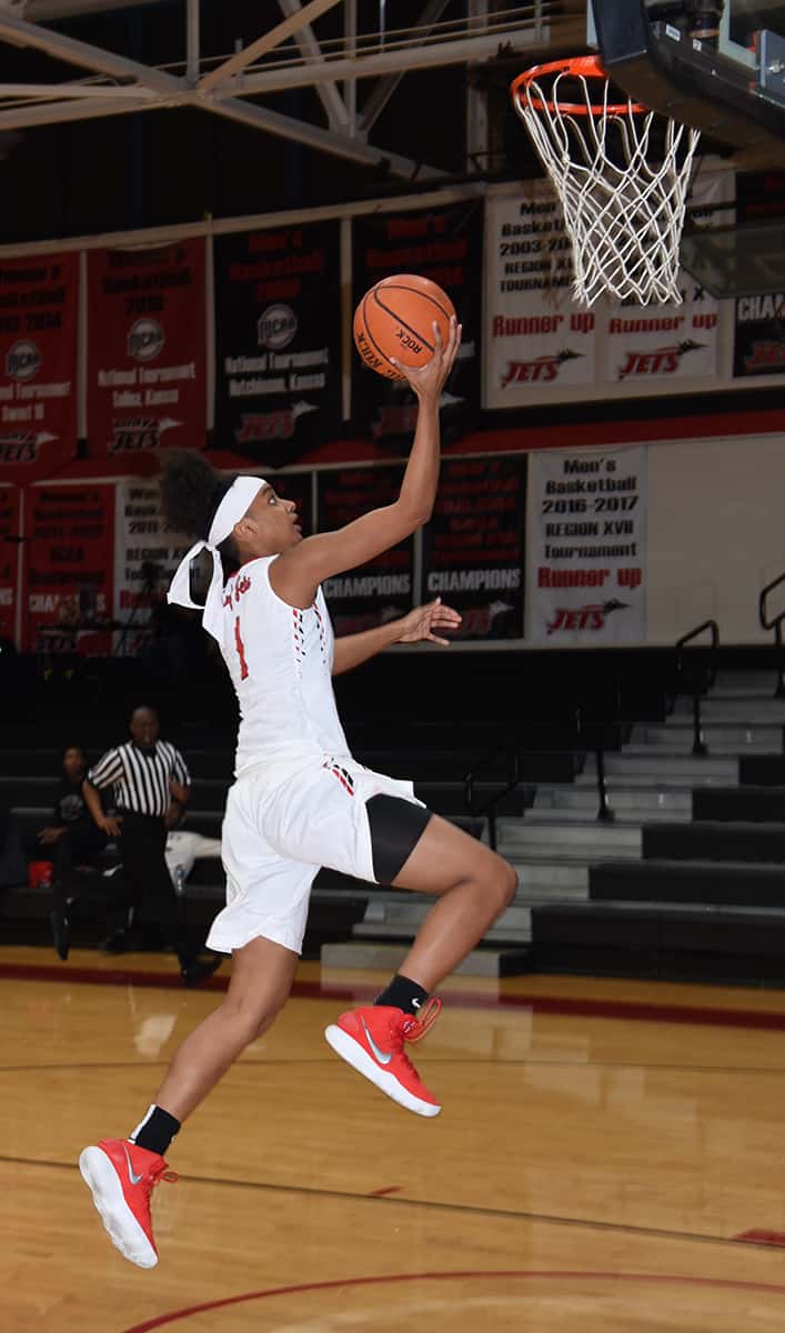 Lady Jets Ricka Jackson, 1, is shown above going in for a lay-up against Eastern Florida.