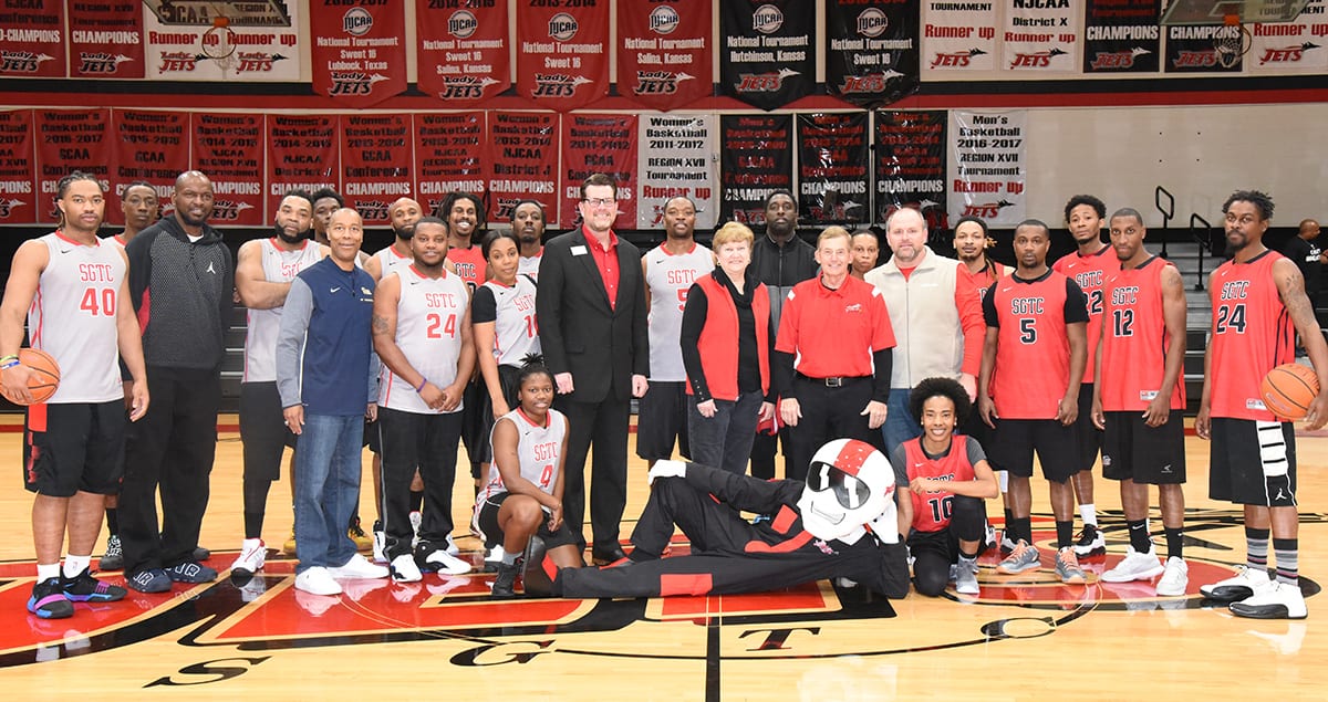 SGTC President Dr. John Watford is shown above with retired Vice President of Administrative Services and the college’s first Athletic Director Janice Davis and SGTC President Emeritus Sparky Reeves and former Athletic Director Steven Wright with ACE and former coach Douglas Byrd and members of the Jets and Lady Jets that participated in the Gray – Red alumni game as part of the 70th anniversary.