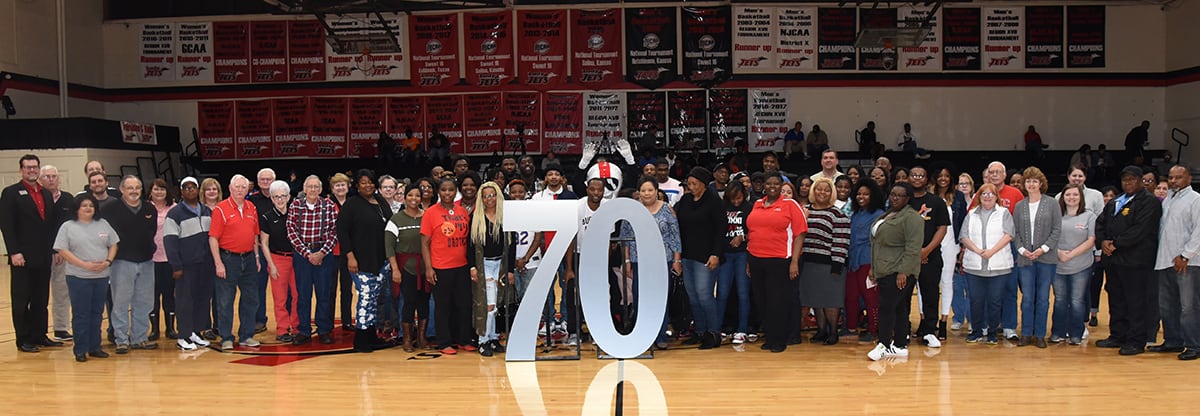 South Georgia Technical College alumni, retirees, current employees and students were recognized during halftime of the Jets basketball game in honor of the 70th anniversary of the college. Over 70 people in attendance stepped onto the court for the photograph.