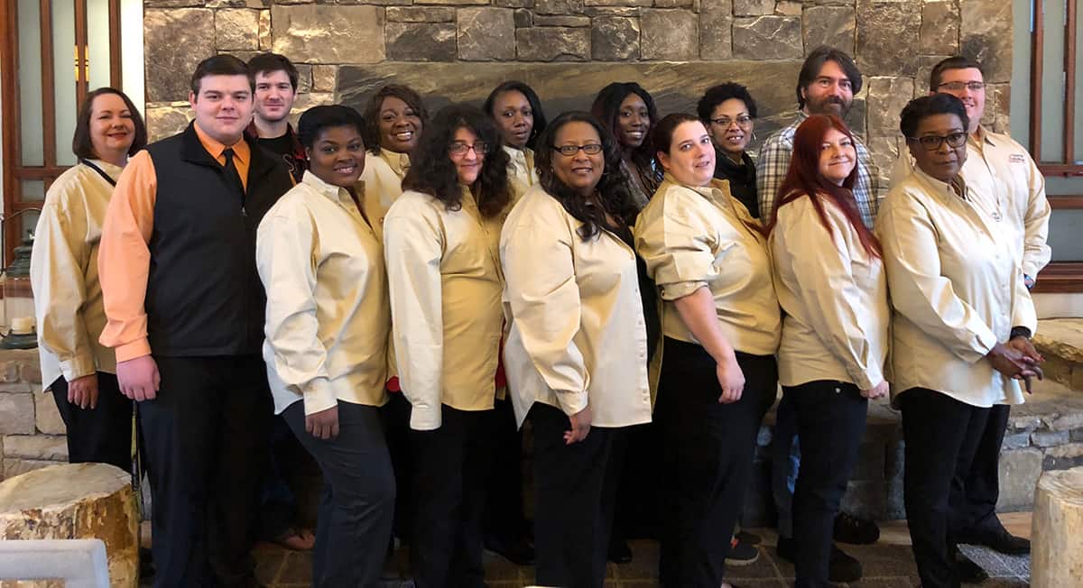 South Georgia Technical College’s GSGA/NTHS Winter Conference competitors, attendees and advisors are pictured at The Lodge and Spa resort at Callaway Gardens following the conference. Back row from left to right are: advisor Kari Bodrey, Dakota Hall, advisor Mia Collier, Desiray Kenney, Katelyn Burgess, Stephanie John, D.W. Persall and Joshua Chappell. Front row from left to right are: Michael Dewberry, advisor Katrice Taylor, Jennifer West, advisor Dr. Michele Seay, Kimberly Trejo, Tonya Rodgers and advisor Cynthia Carter.