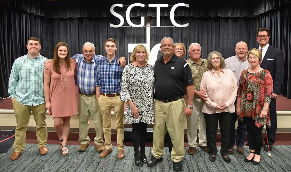 South Georgia Technical College President Dr. John Watford (back row – far right) is shown above with Rick and Donna Davis (center) and their family and close friends who came to wish him well during his retirement reception with over 33 years of service to South Georgia Technical College.