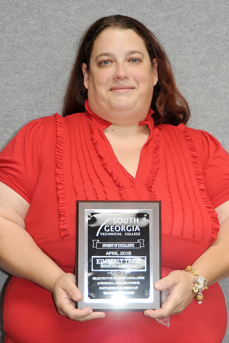 Kimberly Trejo of Cordele, a Medical Assisting Student, was named South Georgia Technical College’s Crisp County Center Student of Excellence for April 2018. She is shown with her plaque of recognition.