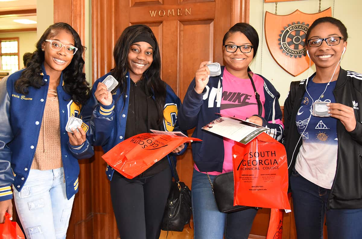 Some of the Crisp County High School students who attended the South Georgia Technical College Spring Take-Off event are shown above with their free SGTC “Track It Wrist Fitness” bands that they received at the event at the Cordele Community Clubhouse.
