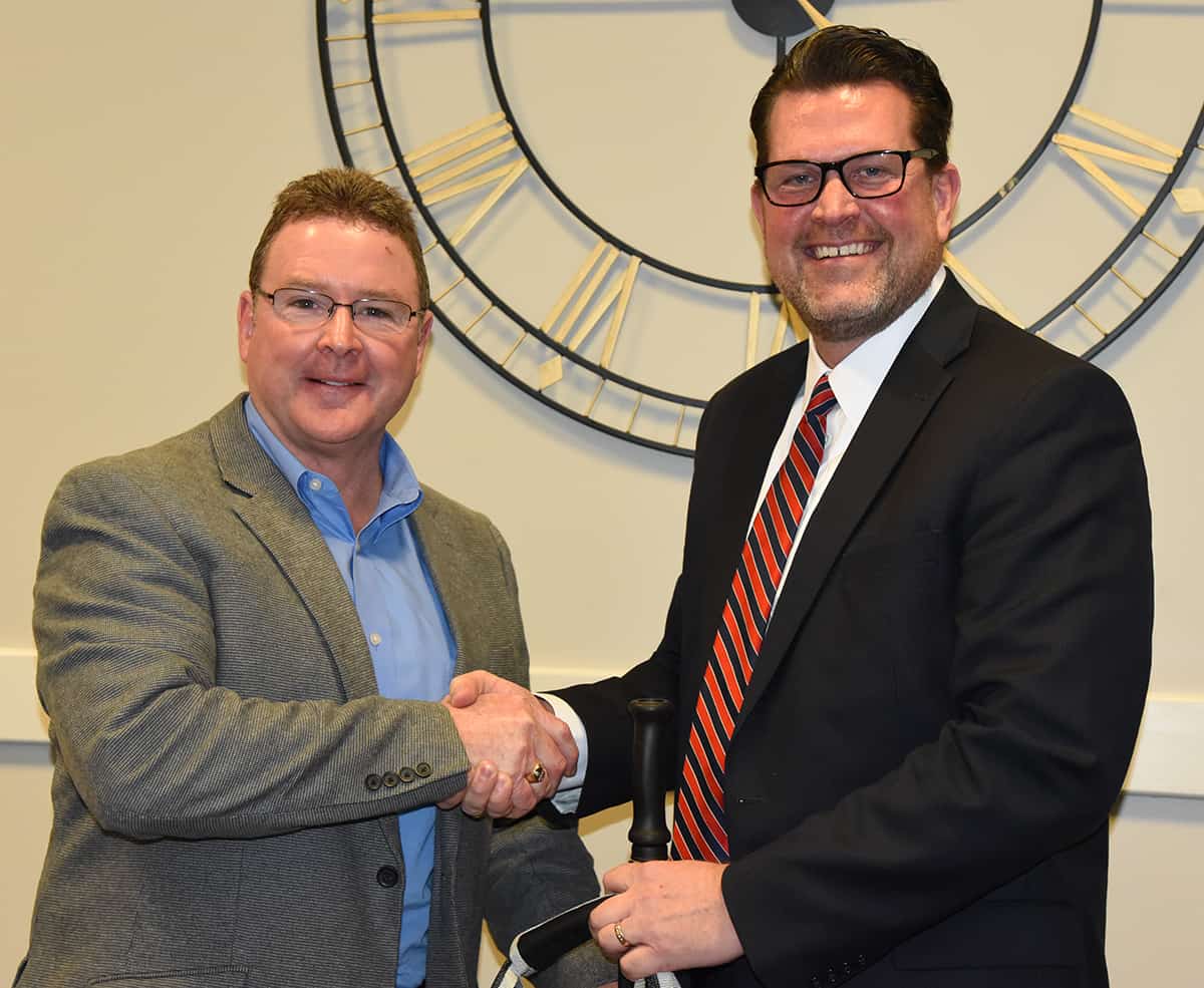SGTC President Dr. John Watford (r) is shown above congratulating Don Porter (left) on being appointed to the South Georgia Technical College Board of Directors.