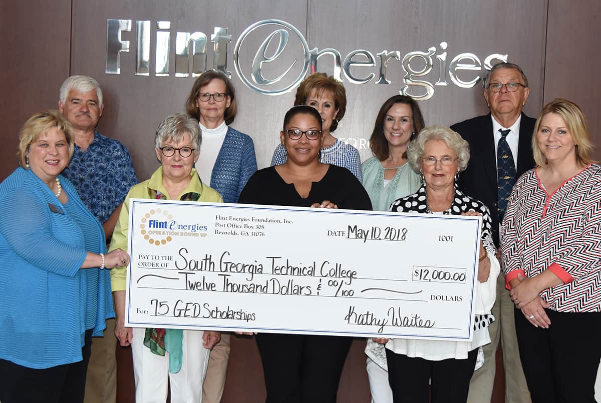 South Georgia Technical College Foundation Executive Director and SGTC Vice President for Institutional Advancement Su Ann Bird is shown above (right) accepting a check from the Flint Energies Foundation board members to be utilized for GED scholarships.