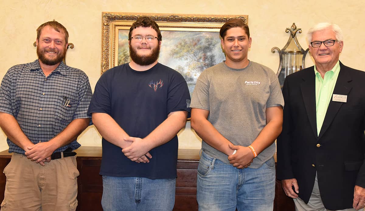 Shown above (l to r) are: SGTC Diesel Equipment Technology Instructor Chase Shannon with his students who received the Caterpillar Excellence Scholarships recently. They are Justin E. Parker from Oglethorpe, GA and Willie C. Pittman from Mauk, Georgia. Parker graduated from Americus Sumter High School in 2017 and Pittman graduated from Taylor County High School in 2017. SGTC Academic Dean Raymond Holt is also shown with the scholarship recipients.