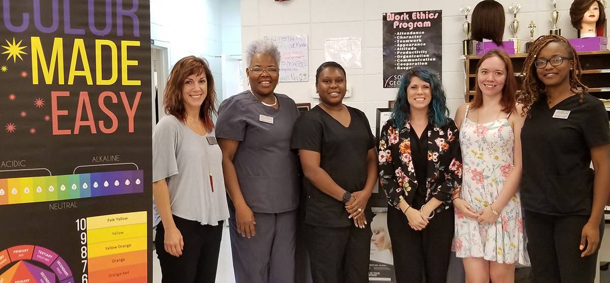 SGTC Cosmetology Instructor Dorothea Lusane McKenzie (second from left) is shown above with her lab instructor Samantha Willis, Instructor Trainee and former cosmetology student Shantray Ross, Jennifer Bowens of Miss J’s Salon in Fort Valley and her assistant Jessicia Keister, and SGTC Instructor Trainee Mikeeshia Towns.