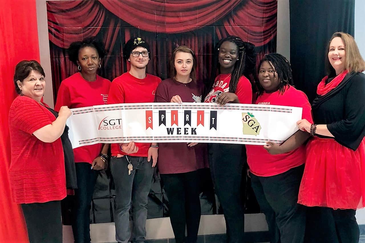Members of South Georgia Tech’s Student Government Association display their school spirit during spirit week by wearing their best red and black outfits.