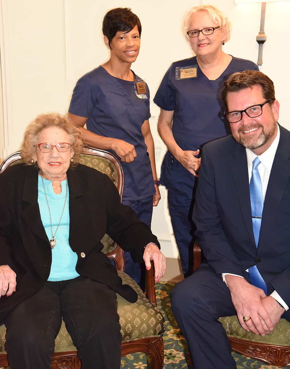South Georgia Technical College President Dr. John Watford (seated right) is shown above thanking Marie Waitsman (seated left) for the new endowed healthcare scholarship that she and her family endowed in honor of two longtime Magnolia Manor employees, “Kitty” LaDaisy Battle (standing left) and Laurie Jessop. (standing right).