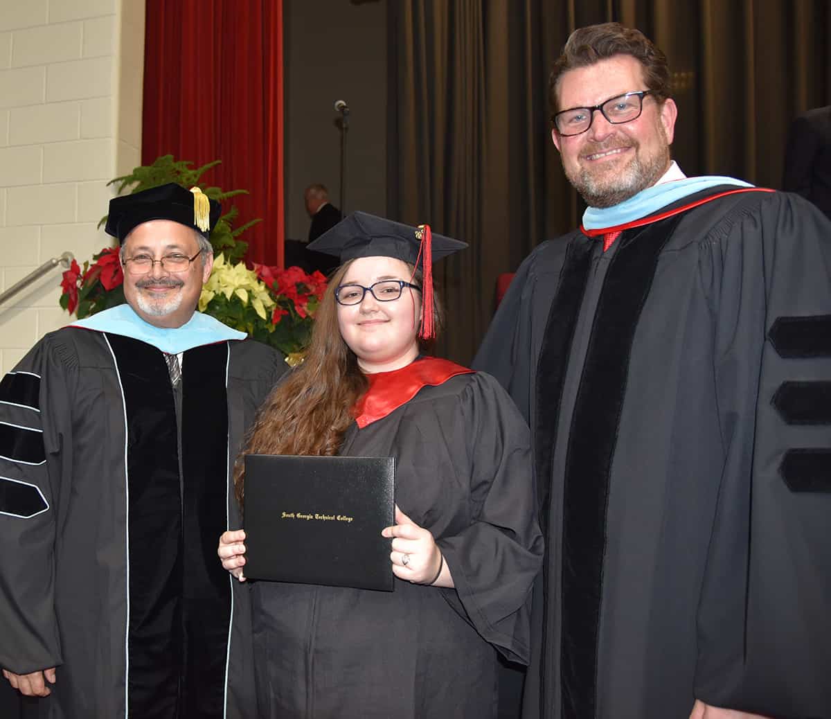 SGTC Academic Dean Dr. David Finley is shown above with his daughter, Hannah Finley and SGTC President Dr. John Watford. Dr. Finley was able to award his daughter, Hannah, with an associate of applied science degree in Computer Support Specialist and Networking Specialist.