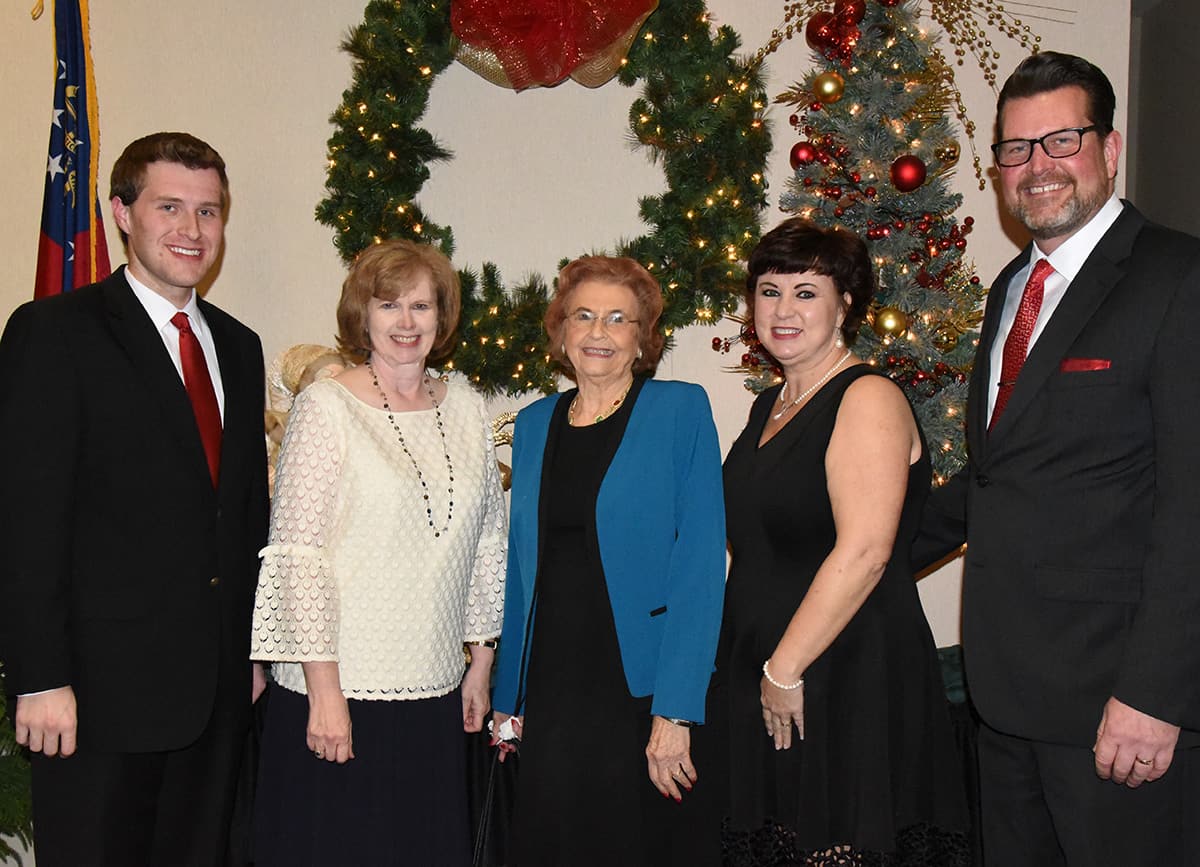 South Georgia Technical College President Dr. John Watford and his wife, Barbara, are shown with his mother, Doris, his sister Dr. Lettie Watford, and son, Mark Watford as they prepared to welcome guests to the South Georgia Tech Christmas gala.