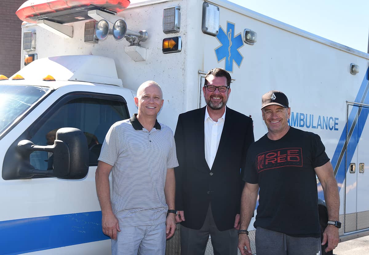 South Georgia Technical College President Dr. John Watford (c) is shown above with Jamie Hendren and Bruce Wilcox who delivered the ambulance for Project El Crucero to the South Georgia Technical College campus and presented Dr. Watford with the keys to the donated ambulance.