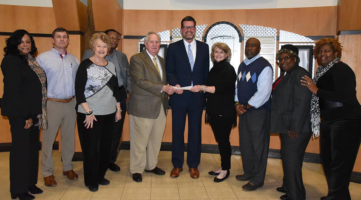 Shown above (l to r) are Americus and Sumter County Hospital Authority members: Dr. Deborah Jones of South Georgia Technical College, Lewis Webb, Sherrill House, Dr. Fred McLaughlin, Dr. David Kitchens presenting the check to SGTC President Dr. John Watford, along with Hospital Authority members Ginger Starlin, Robert Harvey, Pamela Angry and Fredia Gardner.