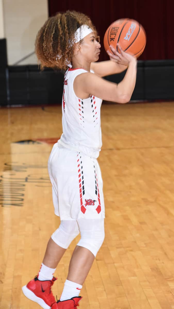 Alyssa Nieves, 4, is shown shooting for three points. She was five of seven from the three-point line against Southern Crescent.