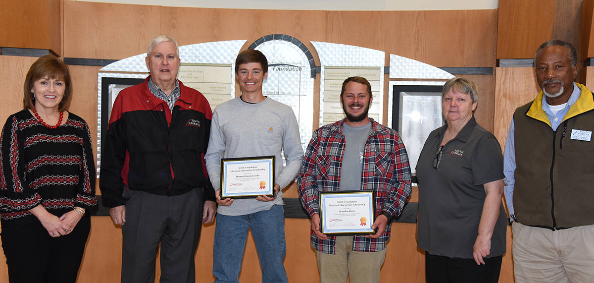 Shown above (l to r) are South Georgia Technical College Economic Development Assistant Tami Blount who works with the SGTC Electrical Lineworker program along with SGTC Vice President of Economic Development Wally Summers, SGTC Electrical Lineworker scholarship recipients Thomas Houston Locke and Brandon Haire with SGTC Electrical Lineworer Instructors Sandra Kay Royal and Sidney Johnson.