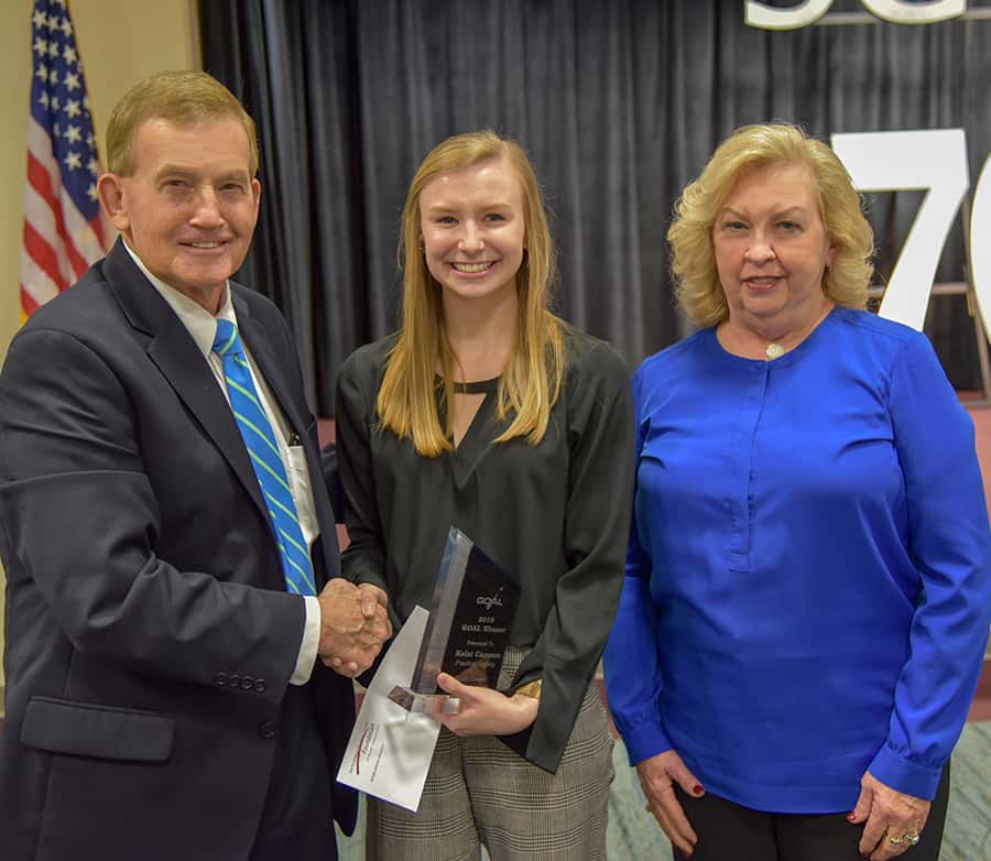 South Georgia Technical College President Emeritus Sparky Reeves (l) and Allene (right) are shown above presenting a scholarship check to 2019 GOAL winner Kelsi Cannon (c).