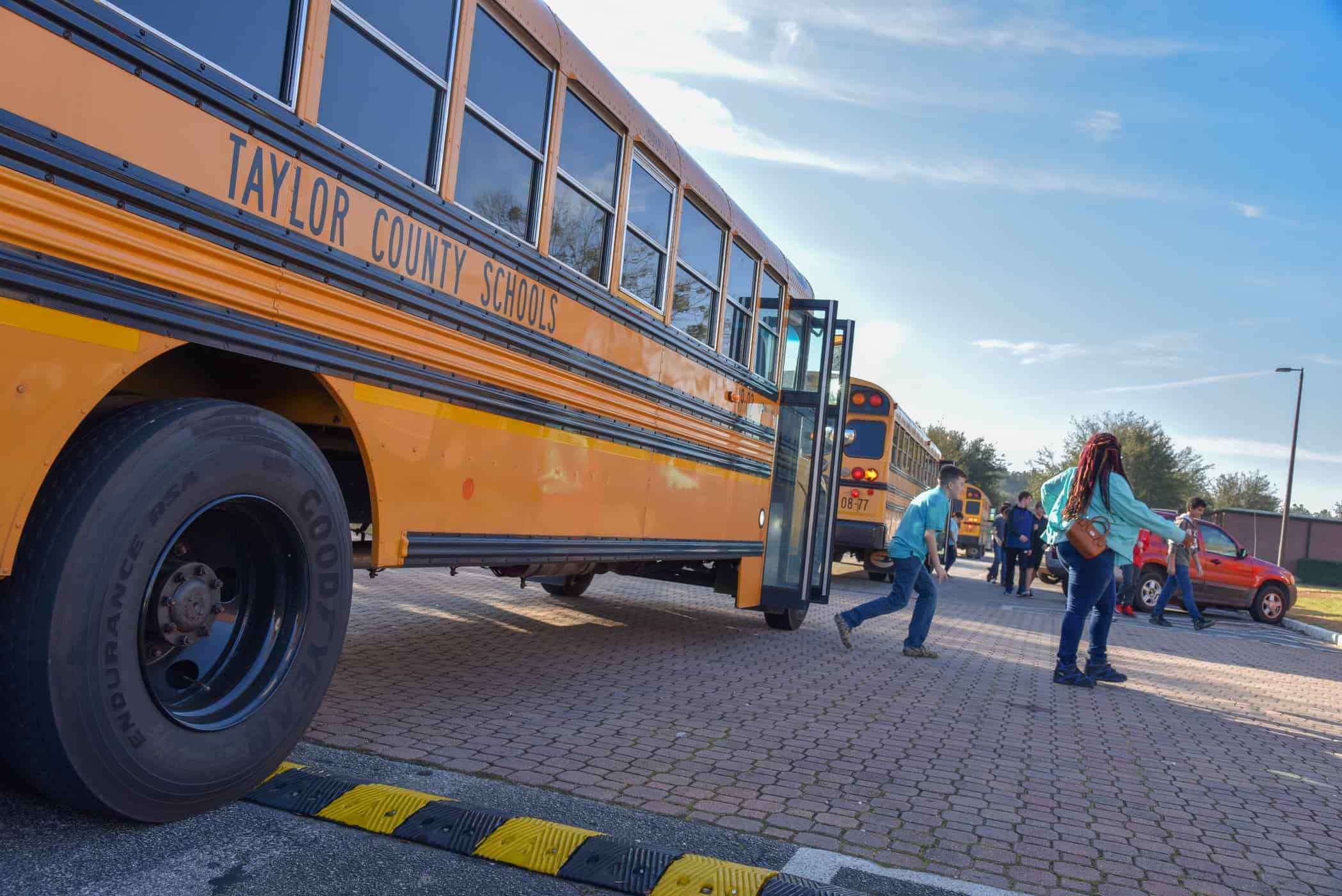 A Taylor County Middle School student exits the school bus before running into a tour on South Georgia Tech’s campus.