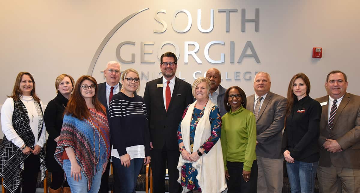 Taylor County Chamber of Commerce Board of Directors and other officials attended a meeting on the campus of South Georgia Technical College and received a tour of the campus and highlights from the other 200 associate degree, diploma, and technical certificate of credit educational programs available at SGTC. Shown (l to r) are: Shonda Blair, Executive Director of the Taylor County Development Authority; Casey Bean, Regional Representative Region 8 of the Georgia Department of Community Affairs; Becky Forbes, Taylor County Chamber of Commerce Board member and Georgia Strawberry Festival Board member; Wally Summers, SGTC Vice President of Economic Development; Nicole Acree, Vice Chair and board member of the Taylor County Chamber of Commerce; SGTC President Dr. John Watford, Susan Poole, Manager of Executive Services & Community Investment Liaison for Flint Energies; Earl Lockhart, Taylor County Development Authority Board member; Patricia Lockhart, Retired Educator; Matthew Reed, President/CEO of the Citizens Bank of Taylor County; Miranda Hunter Co-Owner/Operator of Full Power Diesel, and SGTC Director of Business and Industry Services Paul Farr.