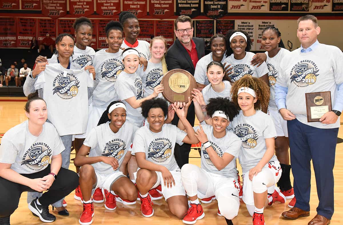 South Georgia Technical College President Dr. John Watford is shown above with the 2018 – 2019 Region XVII Champion Lady Jets and head coach James Frey and Assistant Coach Kezia Conyers.